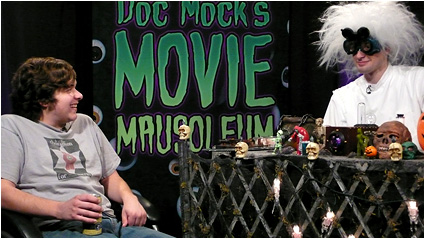 Doc Mock and guest Josh Simpson enjoy some cheesy cinema gold!